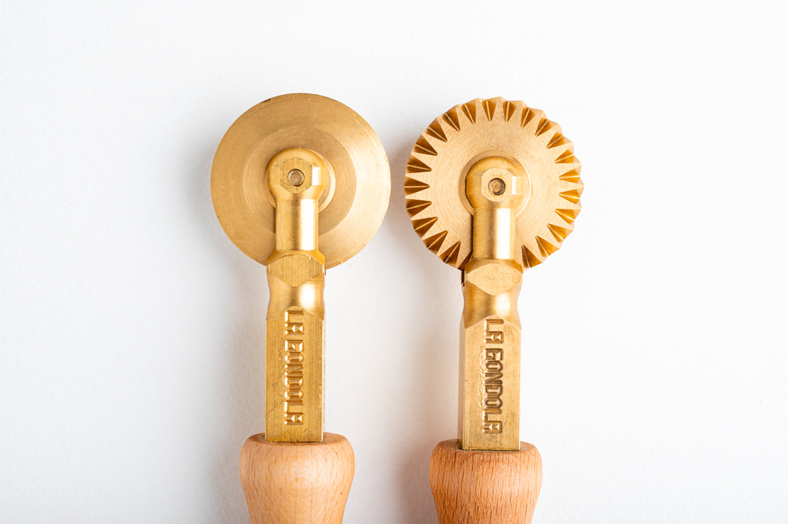 LaGondola Set of 1 Festooned Wheel and 1 Smooth Wheel